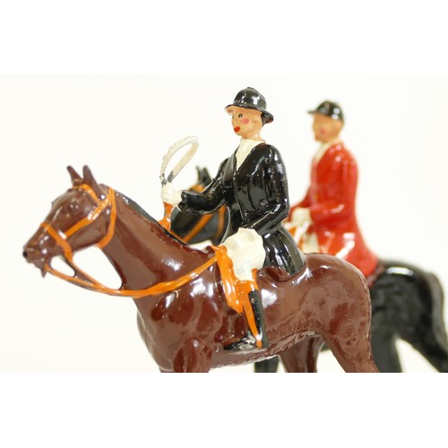 372 - Britain's hand painted lead figures, Hunting, with four riders on horseback and eight hounds