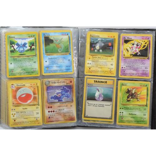 389 - Over 100 Pokemon cards, including holographic cards, together with 10 Digimon cards, presented in a ... 