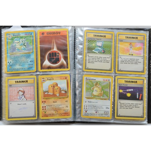 389 - Over 100 Pokemon cards, including holographic cards, together with 10 Digimon cards, presented in a ... 