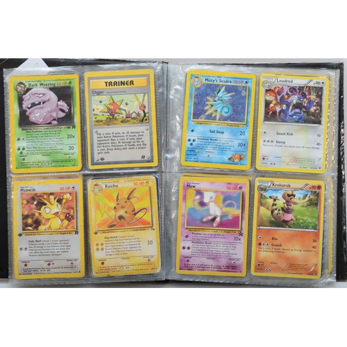 389 - Over 100 Pokemon cards, including holographic cards, together with 10 Digimon cards, presented in a ... 