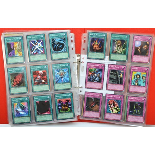 390 - A collection of Yu-Gi-Oh! cards, believed to be the original 200 cards, including foils, together wi... 