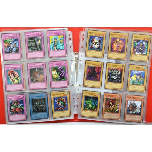 390 - A collection of Yu-Gi-Oh! cards, believed to be the original 200 cards, including foils, together wi... 