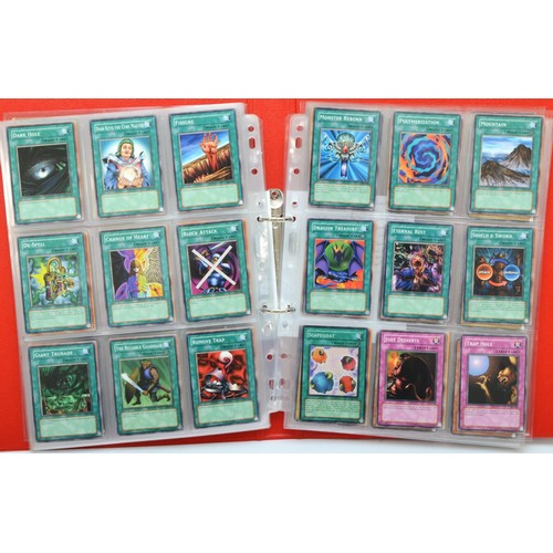 390 - A collection of Yu-Gi-Oh! cards, believed to be the original 200 cards, including foils, together wi... 