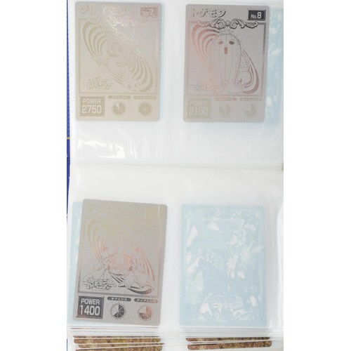 392 - A collection of 55 large Digimon cards, from a set of 65, including holographic and foil cards

To b... 