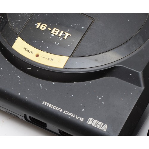 397 - A Sega Megadrive (serial No 420071481),with power and AV cables, two controllers, together with six ... 