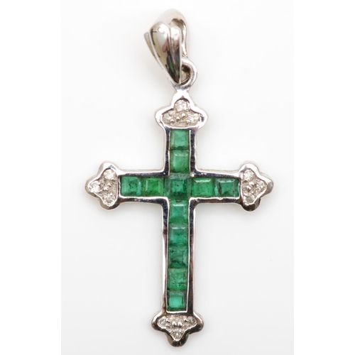 241 - A 14ct white gold emerald and brilliant cut diamond cross pendant, 24 x 17mm, 1.4gm