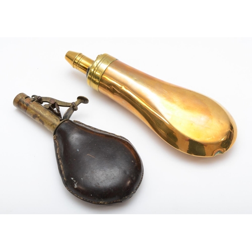 421 - A 19th century brass and copper powder flask, 18cm and a leather cased example with shot15cm