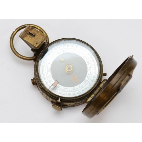 425 - A Pitkin WWI military compass, brass case with a blackened finish, stamped on verso with broad arrow... 