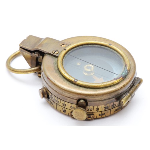 425 - A Pitkin WWI military compass, brass case with a blackened finish, stamped on verso with broad arrow... 