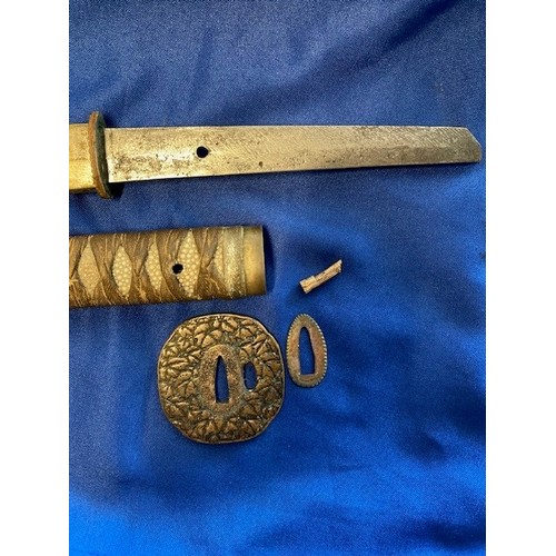 435 - A WWII Japanese Samurai Katana sword, with fish skin and woven cotton hilt, brass tsuba with floral ... 