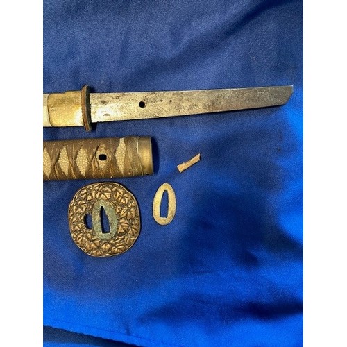 435 - A WWII Japanese Samurai Katana sword, with fish skin and woven cotton hilt, brass tsuba with floral ... 