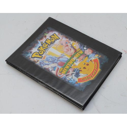 394 - A collection of Pokemon merchandise, to include binders (two of them without cards), stickers, two T... 