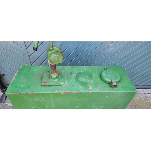 15 - A Castrol green oil dispenser