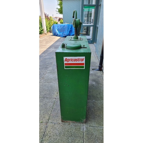 15 - A Castrol green oil dispenser