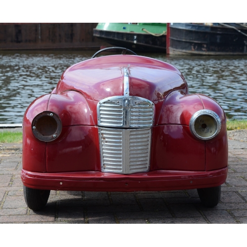 30 - An Austin J40 pedal car, c.1948, offered in red, partially restored.
The car was made from heavy-gau... 