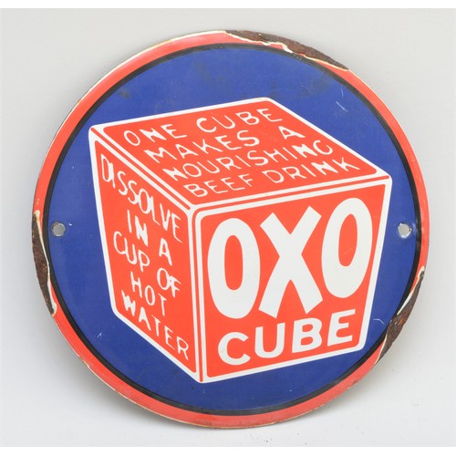 87 - A vitreous enamel OXO cube circular sign, 15cm diameter