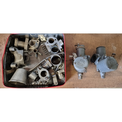 105 - Two Amal carbs, 689/205 and 389/45 together with other spares