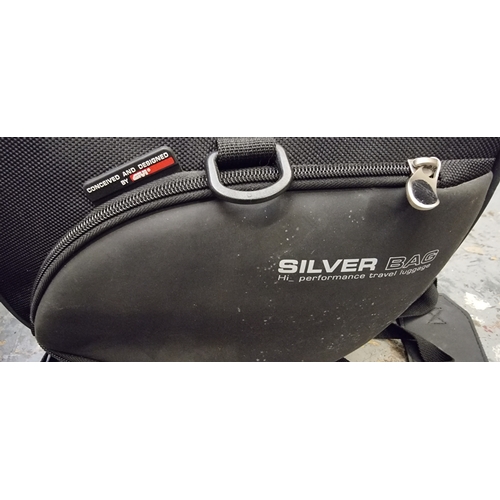 125 - A Givi pair of soft panniers and Silver bag, with protective covers