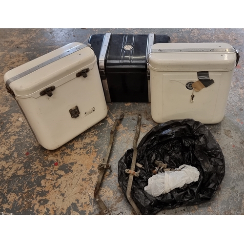 126 - A pair of Craven hard panniers with brackets and a Craven top box