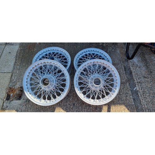 130 - A set of four Austin Healey 3000, and others, wire wheels, shot blasted and powder coated