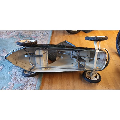 31 - An Austin Pathfinder pedal car, c.1949/50. No number stamped on seat but there is a replacement pane... 
