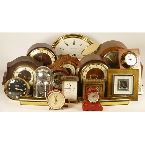 A collection of mechanical and quartz clocks, including anniversary ...