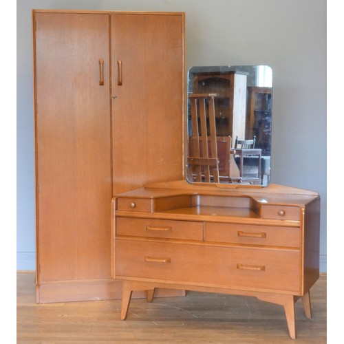 A mid 1950's G plan chest of dressing table by E Gomme, from the Brandon range, single rectangular mirror over two small drawers, over another two small drawers and a single large drawer, on squared tapered legs, 106 x 142 (including mirror) x 46cm, together with a matching double wardrobe, lockable doors open to reveal a fitted shelved interior, 92 x 176 x 54cm (2)