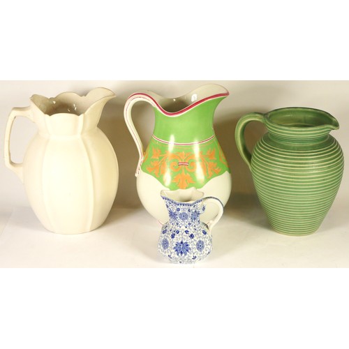 A collection of early 20th century and later ceramic jugs, to include a ...