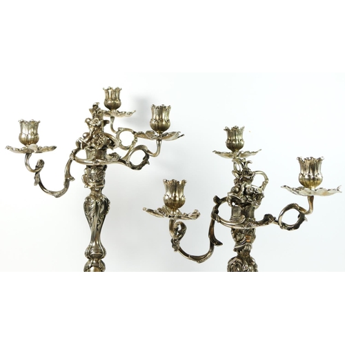 20 - A German 19th century pair of three light silver candelabra, Augsburg date letter P, by IPH, zigzag,... 