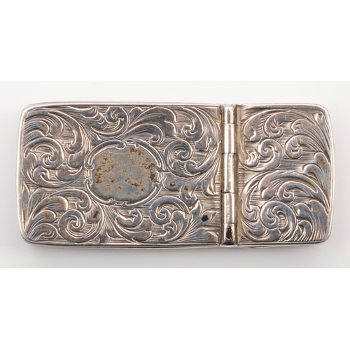 26 - A Victorian silver vesta case, Birmingham 1854, with two hinged compartments, all over floral engrav... 