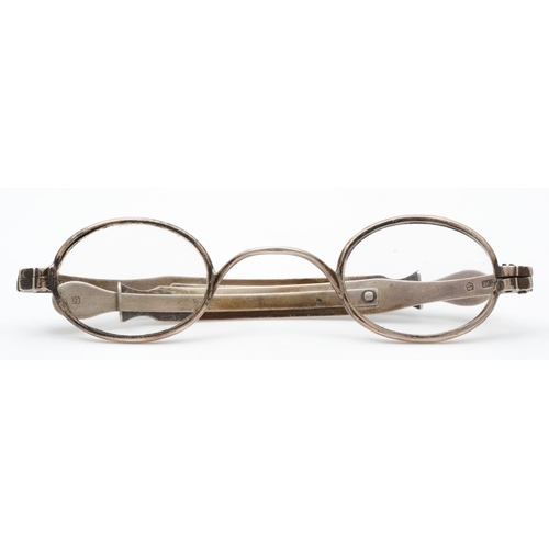 31 - A Victorian silver pair of spectacles, by TM, Birmingham 1839, with sliding arms