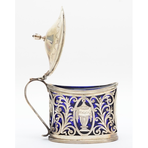 51 - An Edwardian silver Neo Classical mustard pot, Sheffield 1902, with pierced and bright cut decoratio... 