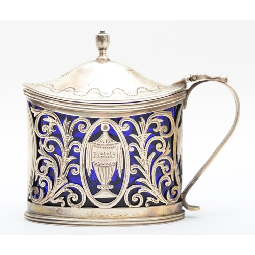 51 - An Edwardian silver Neo Classical mustard pot, Sheffield 1902, with pierced and bright cut decoratio... 