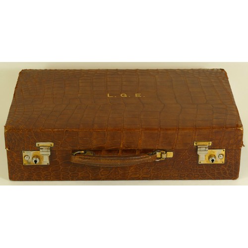 220 - J.C. Vickery of Regent Street, London, a vintage crocodile skin brief case, opening to reveal letter... 