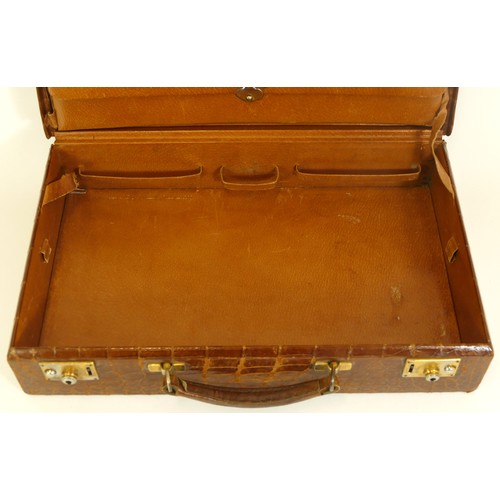 220 - J.C. Vickery of Regent Street, London, a vintage crocodile skin brief case, opening to reveal letter... 