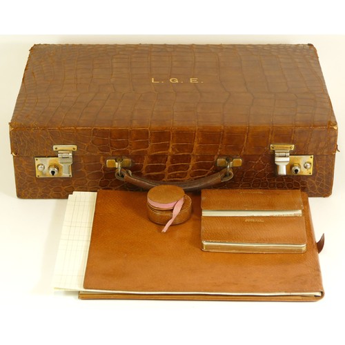 220 - J.C. Vickery of Regent Street, London, a vintage crocodile skin brief case, opening to reveal letter... 