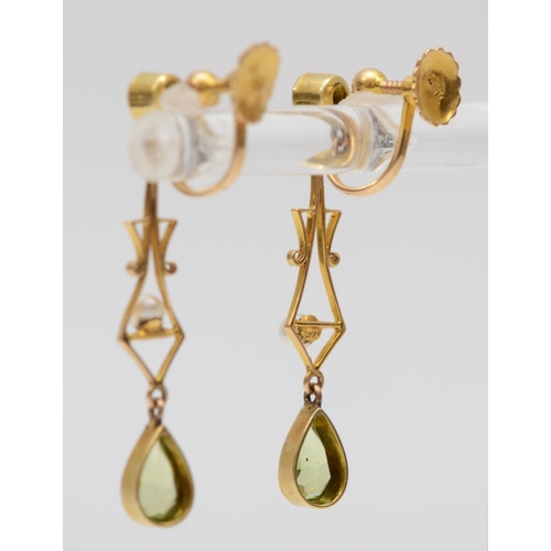 73 - An Edwardian 15ct gold pair of peridot and pearl ear pendants, 31mm,2.4gm