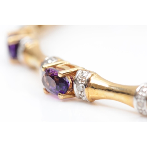 74 - A 9ct gold amethyst and diamond line bracelet, 19cm, 9.1gm