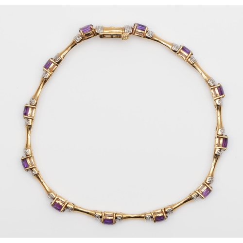 74 - A 9ct gold amethyst and diamond line bracelet, 19cm, 9.1gm