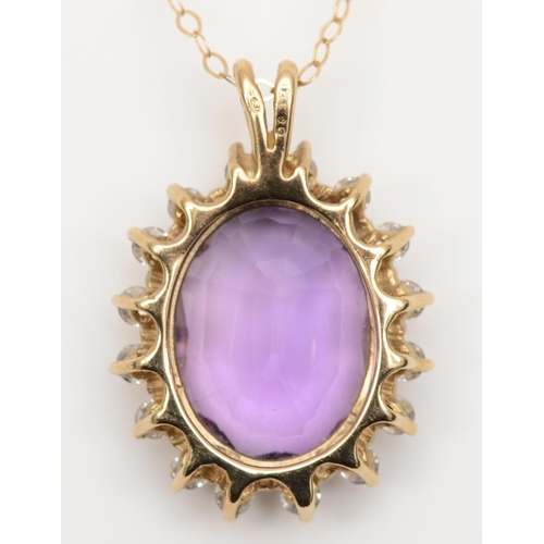 83 - A 9ct gold amethyst and CZ pendant, stone 16 x 12mm, chain, 4.8gm