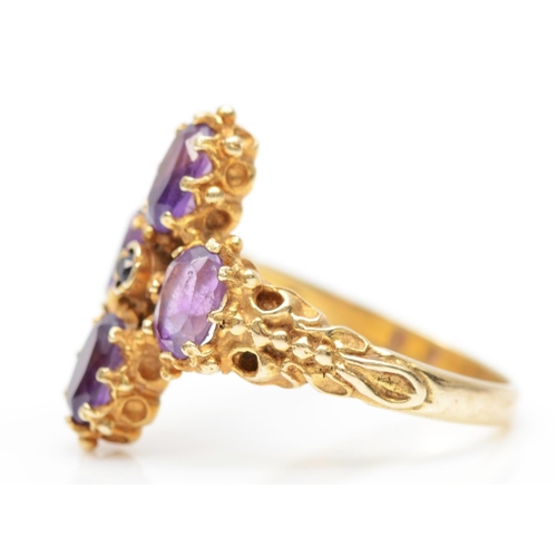 84 - A vintage 9ct gold and amethyst dress ring, London 1977, with carved shoulders, O 1/2, 4.2gm