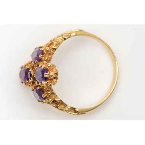 84 - A vintage 9ct gold and amethyst dress ring, London 1977, with carved shoulders, O 1/2, 4.2gm