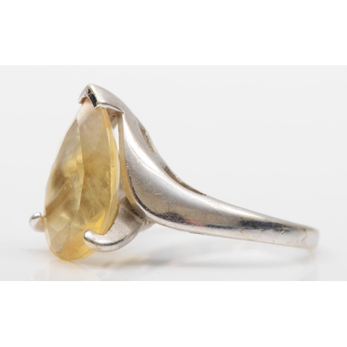 105 - A 9ct white gold single stone citrine ring, claw set with a pear shape stone, 15 x 10mm, N, 3.6gm