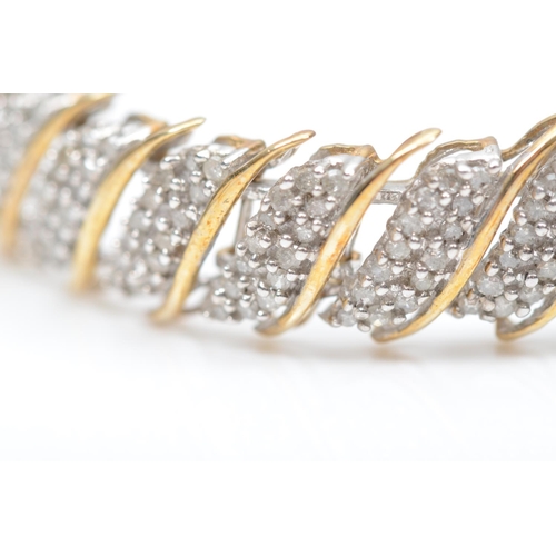 115 - A 9ct gold and diamond twist link bracelet, stated weight 2.75gm, 19cm, 16.5gm