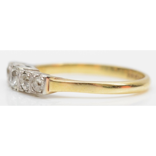 129 - A vintage 18ct gold five stone diamond ring, set with graduated old cut brilliant stones, L 1/2, 2.6... 