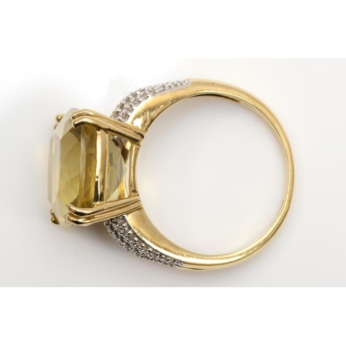 140 - A 9ct gold citrine and diamond dress ring, claw set with a mixed cut stone, 14 x 14mm, diamond set s... 