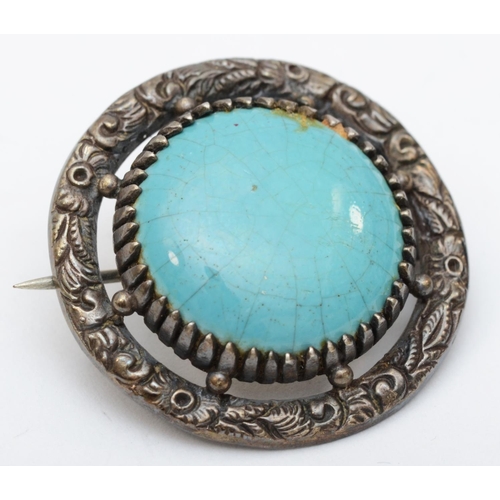 144 - A silver Arts and Crafts brooch, mounted with a Ruskin turquoise pottery disc, signed, 30mm