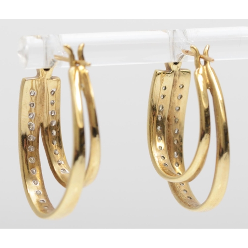 161 - A 9ct gold pair of diamond set double hoop ear rings, set with single cut stones, 25mm, 5.4gm