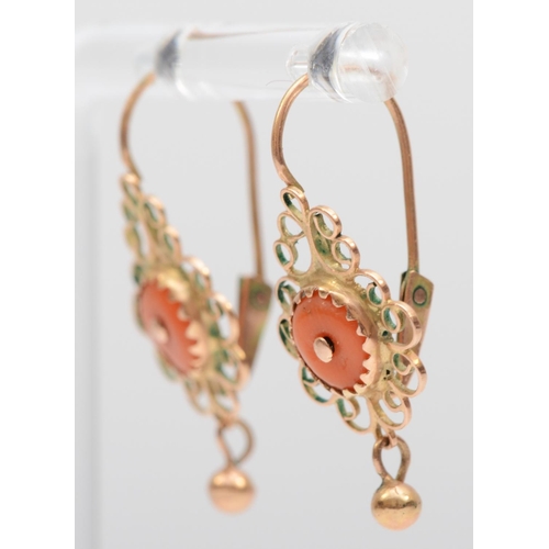 163 - A vintage pair of rose gold and coral ear rings, tests as 14K gold, 21mm overall, 2gm