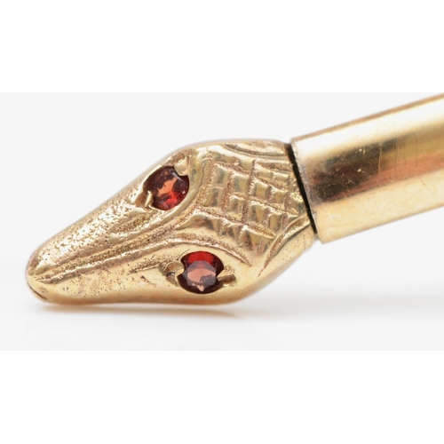 164 - A vintage 9ct gold snake bangle, Birmingham 1986, with garnet set eyes, 4.4gm